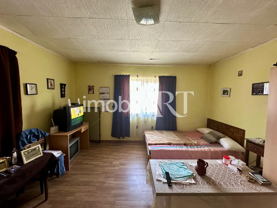 Casă 75 mp în Șoncutu Mic, cu 15 ari grădină – 2 camere, utilități, acces asfalt