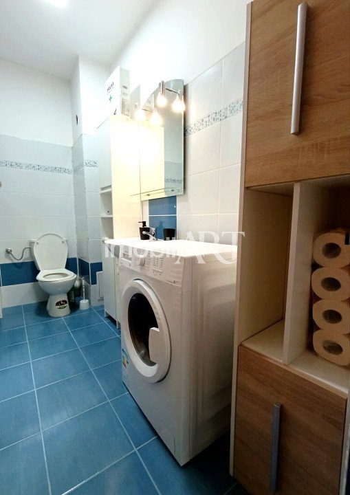 Garsoniera cu balcon , bloc cu lift.